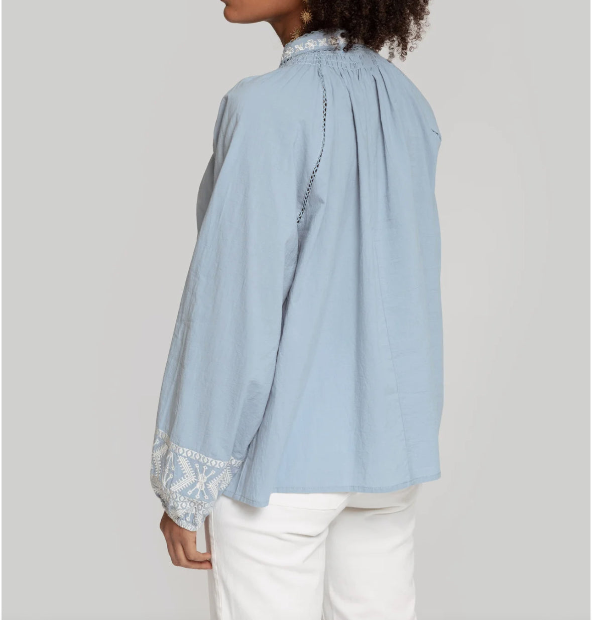Blouse with tassel