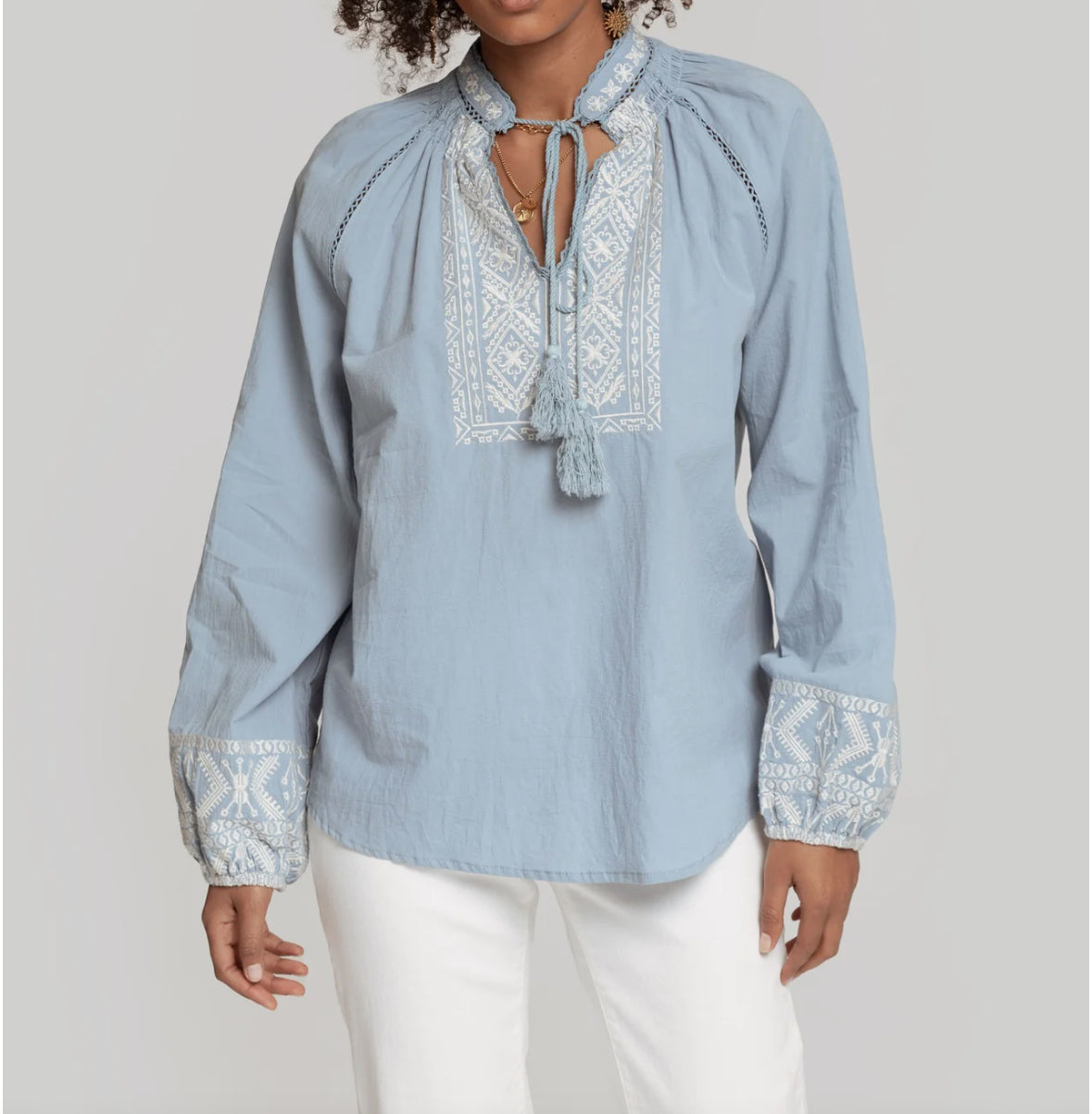 Blouse with tassel
